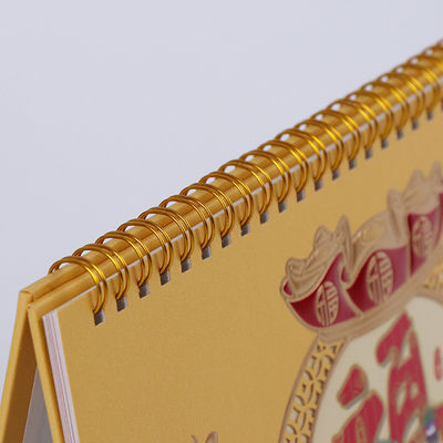 かわいく古典的な螺線形の卓上カレンダーのアート ペーパーの材料および金熱いホイルのスタンプ