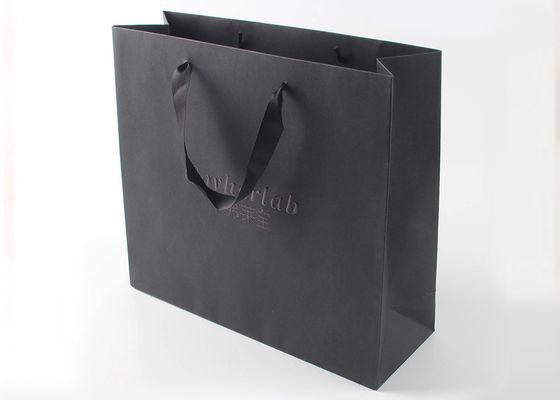 Grosgrainのリボンと再生利用できる贅沢な様式によって印刷されるペーパー買い物袋